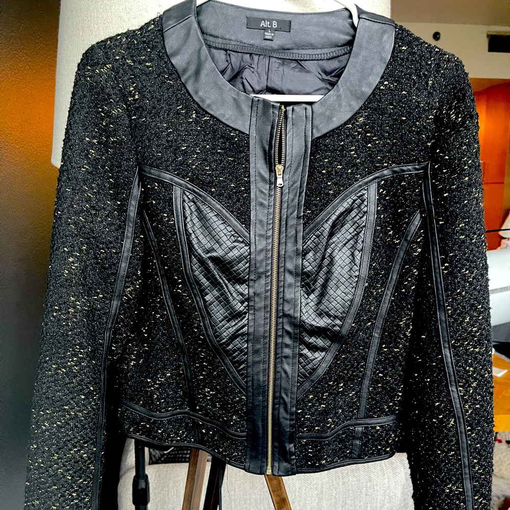 Black and gold jacket with leather trim. Size small